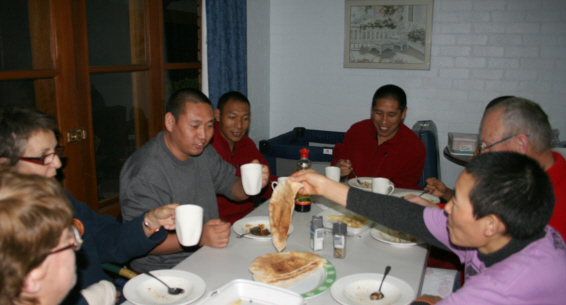 Dinner with monks at the motel.