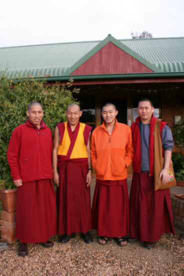Monks outside the motel.